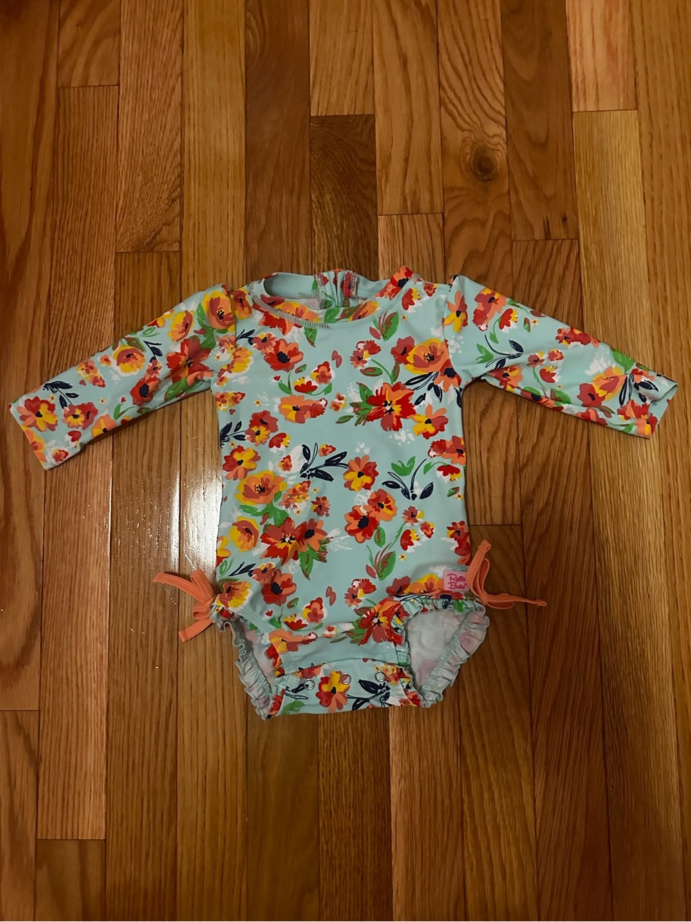 Ruffle Butts Mint One-Piece Swimsuit with Orange Floral Print
